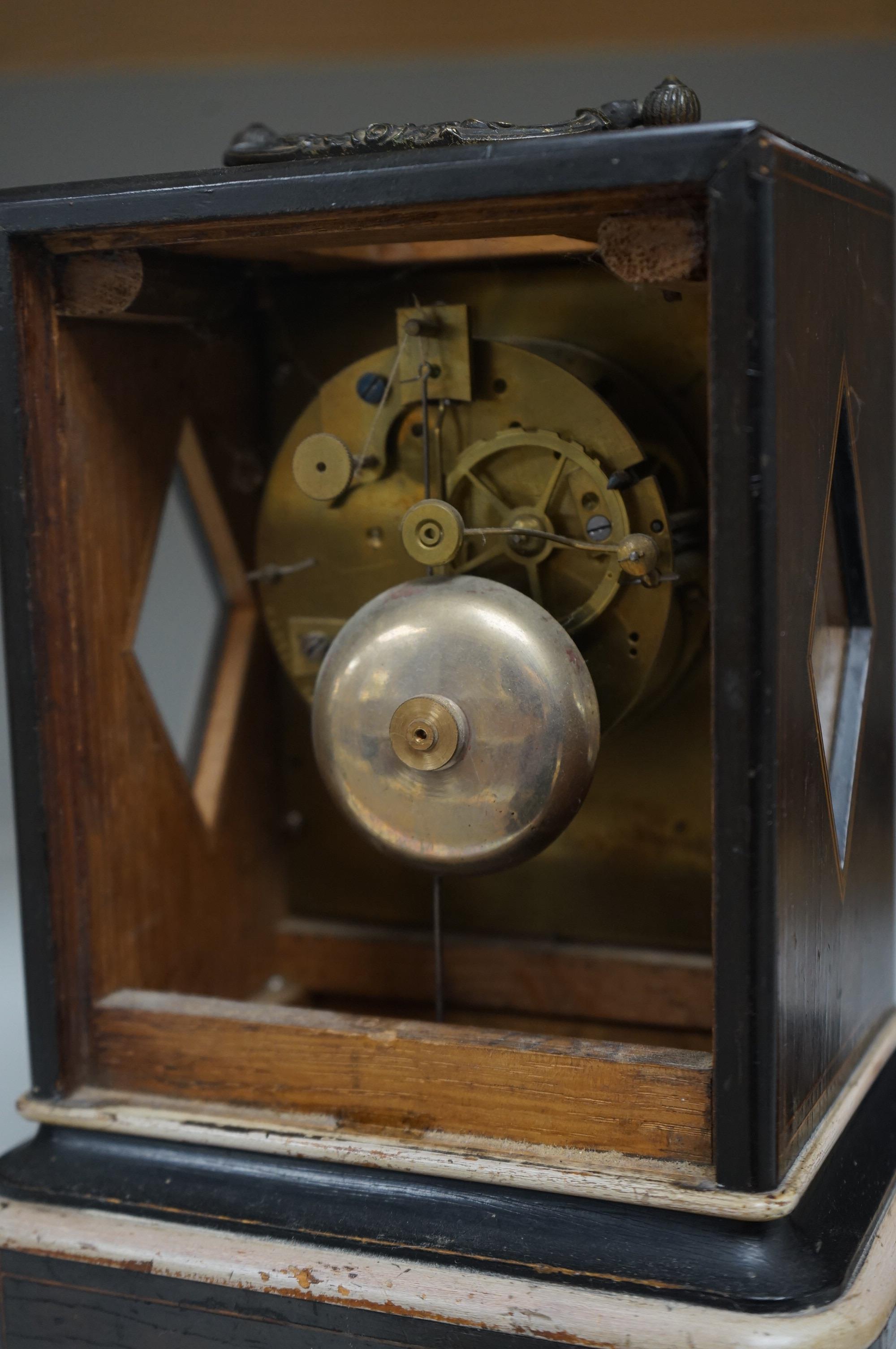 A French inlaid rosewood mantel clock with bone knop, the dial inscribed Martin Baskett. Condition - poor